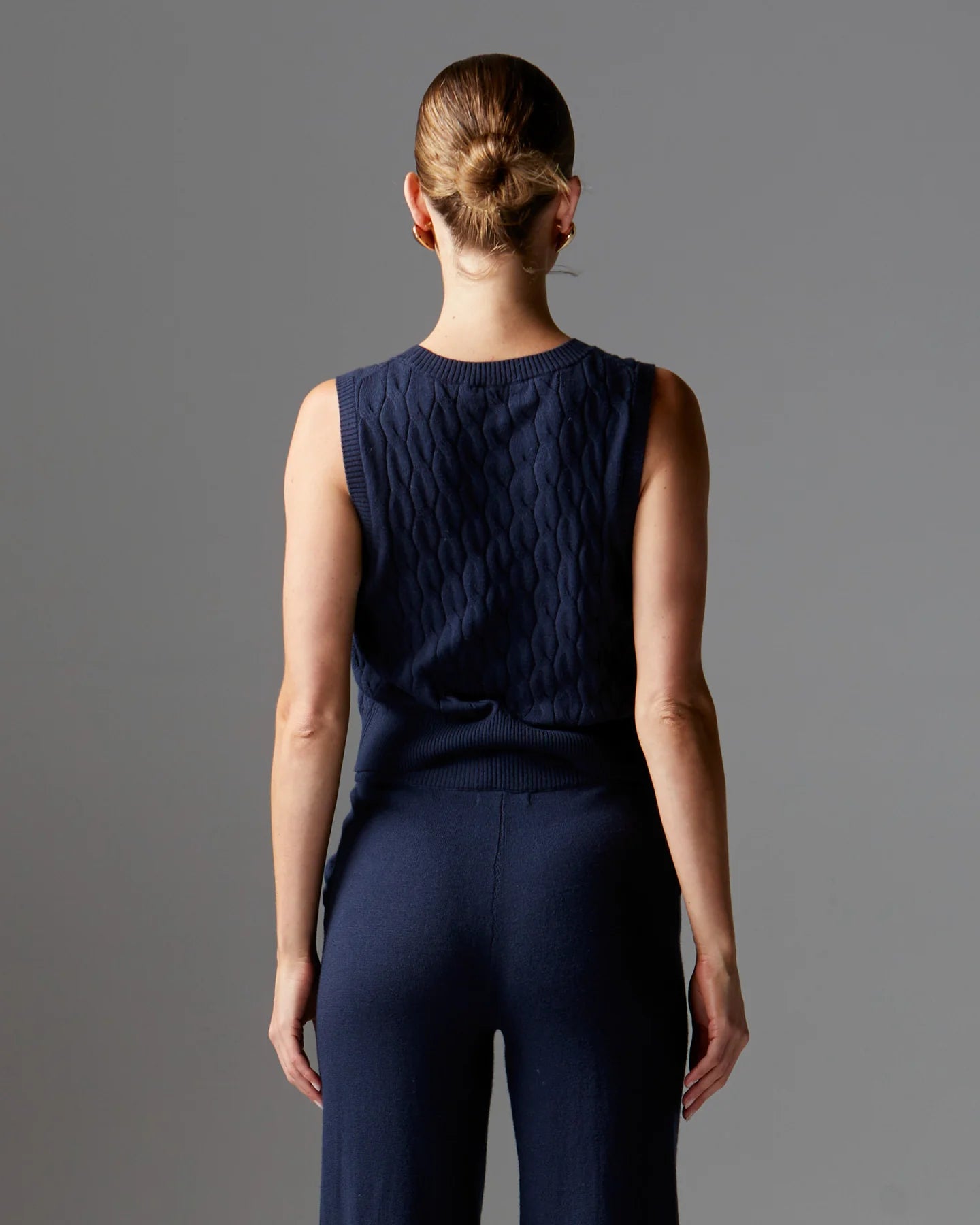 
                  
                    Lotus Knit Vest - Navy
                  
                