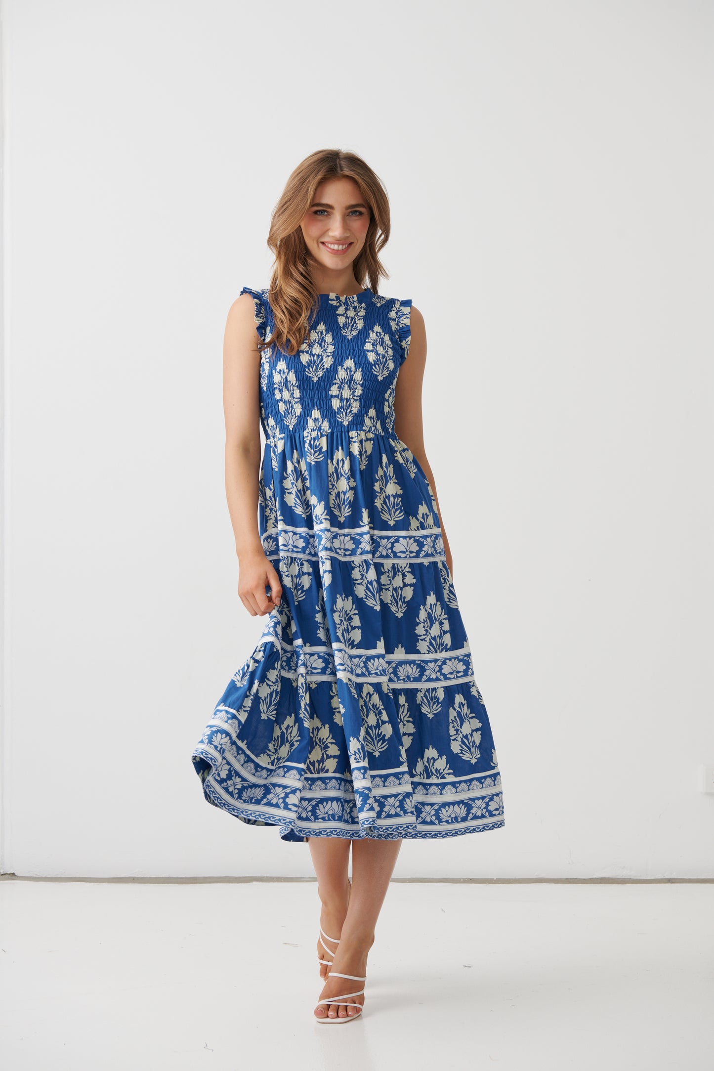 
                  
                    HF22841 Floral Block Dress w/Shirred Flutter Bodice-LAPIS
                  
                